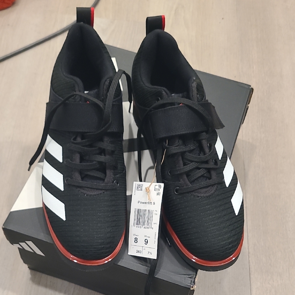 adidas Black Sneakers with White Stripes and Red Accent